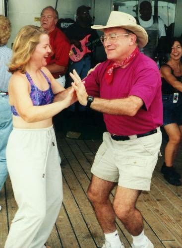 gary hayman and debra enjoying a dance on deck